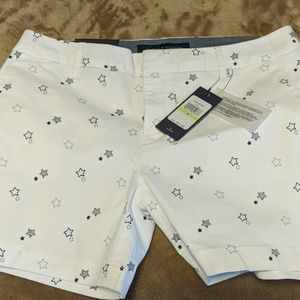 White shorts with Navy stars size 4